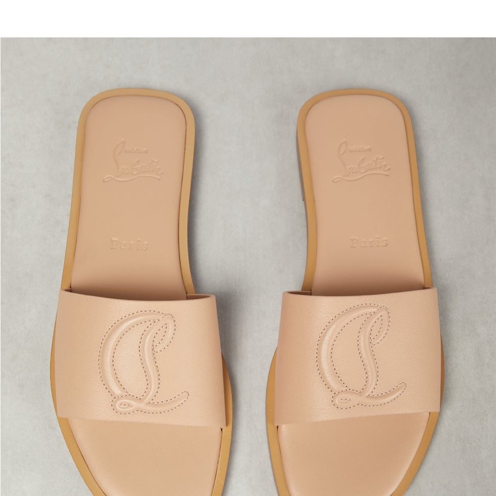 CHRISTIAN LOUBOUTIN
CL embossed leather slides